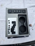 2007-2015 Nissan Armada Console Shifter Bezel Switches & Cup Holders Oem. Fixed Price $45.00.