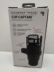 Sharper Image Cup Captain Deluxe 2-IN-1 Adjustable Plastic Phone Holder. Fixed Price $12.00.