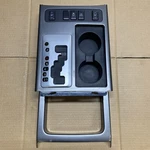 2008-15 Nissan Armada Titan Shifter Trim Bezel Cup Holder Oem Gray. Fixed Price $40.00.