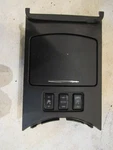 2007 Infiniti G35X Sedan Cup Holder With Switches. Fixed Price $36.00.