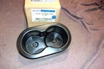 3C3Z-7813562-AAB. 03 F250SD, F350SD. Accessory Cup Holder. Orig. Ford Nos. Fixed Price $40.00.