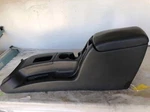 2002 - 2004 Jeep Liberty Front Floor Center Console Armrest With Dual Cup Holder. Fixed Price $45.00.