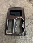 2009-2014 Ford F150 Center Console Cup Holder Shifter Panel 9L34-15045A76-840A. Fixed Price $88.02.