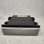 05 Legacy Accessory Holder Compartment Below Radio - Grey. Fixed Price $17.50.