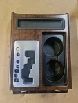 Nissan Titan Shifter Trim Bezel Cup Holder 96912-ZT21A Oem. Fixed Price $75.00.